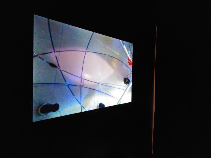 <p>Figs. 23 a,b. Participants interacting with <em>Synesthesia </em>virtually with the live streaming component presented on TV screens.&nbsp;</p>