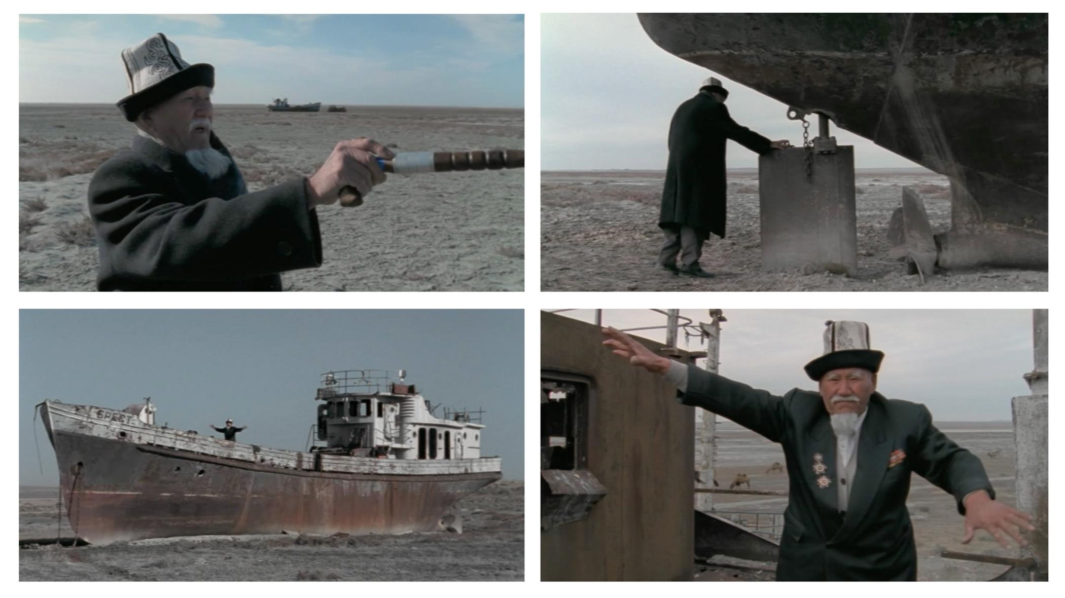 Figure 1: A tableau of four screenshots from Udo Maurer’s film Über Wasser: Menschen und gelbe Kanister (On Water: People and Yellow Cans, 2007). Clockwise: a medium closeup of an old man wearing a traditional hat and pointing his walking stick at something outside the frame. The man touching the rudder of an old boat stranded on land. A shot of the ship from the distance. A medium shot of the man gesturing with his arms on the ship’s deck.