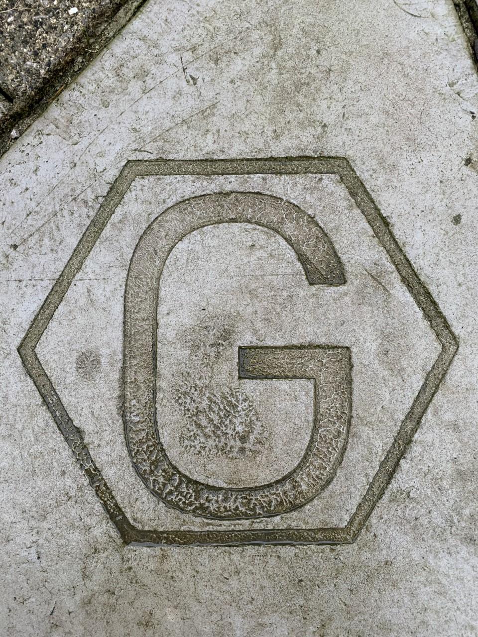 <p>Figure 6 'G' Graphene symbol stamped into concretene; photo taken by the author, 31 December 2022</p>